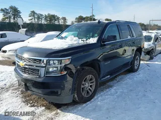 2019 Chevrolet Tahoe LT with VIN 1GNSKBKC7KR138999, listed as a IAAI auction lot 41339420 with 74,297 mi miles. Bid and sale history available at carsss.com. Image 20.