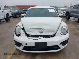 2018 Volkswagen Beetle S with VIN 3VWFD7AT3JM703443, listed as a IAAI auction lot 41437909 with 76,757 mi miles. Bid and sale history available at carsss.com. Image 12.
