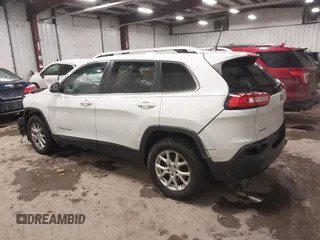 2016 Jeep Cherokee Latitude with VIN 1C4PJMCB1GW119621, listed as a IAAI auction lot 41310872 with 123,841 mi miles. Bid and sale history available at carsss.com. Image 14.