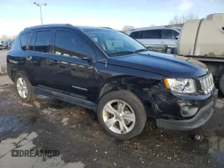 2011 Jeep Compass with VIN 1J4NT1FB1BD192241, listed as a Copart auction lot 48033115 with 60,123 mi miles and Salvage Title. Bid and sale history available at carsss.com. Image 4.