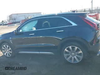 2023 Cadillac XT4 AWD Premium Luxury with VIN 1GYFZDR46PF195391, listed as a IAAI auction lot 41848429 with 31,904 mi miles and . Bid and sale history available at carsss.com. Image 14.