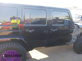 2017 Jeep Wrangler Unlimited Sahara with VIN 1C4BJWEG5HL635319, listed as a IAAI auction lot 42224748 with 141,214 mi miles and . Bid and sale history available at DreamBid. Image 14.