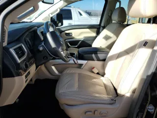 2017 Nissan Titan SL z VIN 1N6BA1F20HN522403, wystawiony jako Copart lot #87477114 z przebiegiem 98 084 mil mil oraz Szkoda całkowita • Salvage title. Historia ofert i sprzedaży dostępna na DreamBid. Obrazek 7.