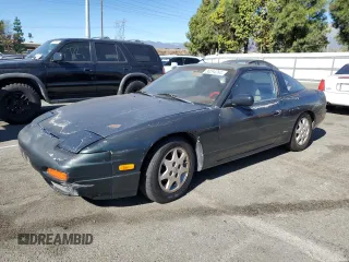 1992 Nissan 240SX SE Limited Edition z VIN JN1MS36PXNW115066, wystawiony jako Copart lot #80294264 z przebiegiem 91 190 mil mil oraz Szkody całkowita. Historia ofert i sprzedaży dostępna na DreamBid. Obrazek 1.