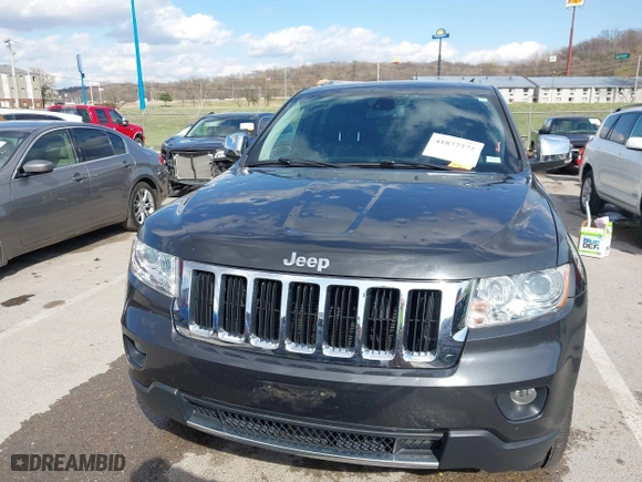 2011 Jeep Grand Cherokee Limited with VIN 1J4RR5GG4BC624876, listed as a IAAI auction lot 41877272 with 166,810 mi miles. Bid and sale history available at carsss.com. Image 12.
