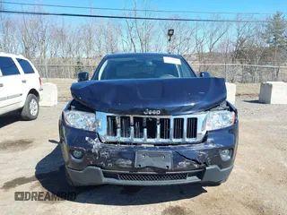 2011 Jeep Grand Cherokee Laredo with VIN 1J4RR4GG3BC670712, listed as a IAAI auction lot 41738127 with 93,714 mi miles and . Bid and sale history available at DreamBid. Image 12.