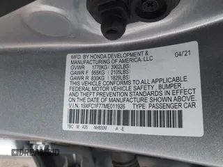 2021 Honda Civic Sedan EX-L with VIN 19XFC1F77ME011926, listed as a IAAI auction lot 41561104 with 76,163 mi miles. Bid and sale history available at carsss.com. Image 9.