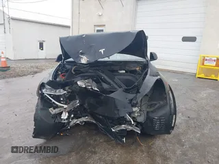 2021 Tesla Model Y Standard Range with VIN 5YJYGDED9MF103989, listed as a IAAI auction lot 41482268 with 33,485 mi miles and . Bid and sale history available at DreamBid. Image 13.
