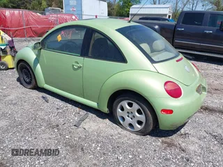 2003 Volkswagen New Beetle Coupe GLS with VIN 3VWCK21C13M406167, listed as a IAAI auction lot 41995409 with 1 mi miles. Bid and sale history available at carsss.com. Image 3.