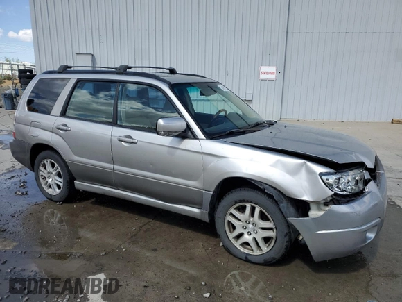 2007 Subaru Forester X L.L. Bean z VIN JF1SG67627H726753, wystawiony jako Copart lot #54957595 z przebiegiem 199 626 mil mil oraz Szkoda całkowita • Salvage title. Historia ofert i sprzedaży dostępna na DreamBid. Obrazek 4.