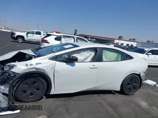 2023 Toyota Prius LE with VIN JTDACAAU7P3013923, listed as a IAAI auction lot 42600973 with 33,958 mi miles and . Bid and sale history available at DreamBid. Image 14.