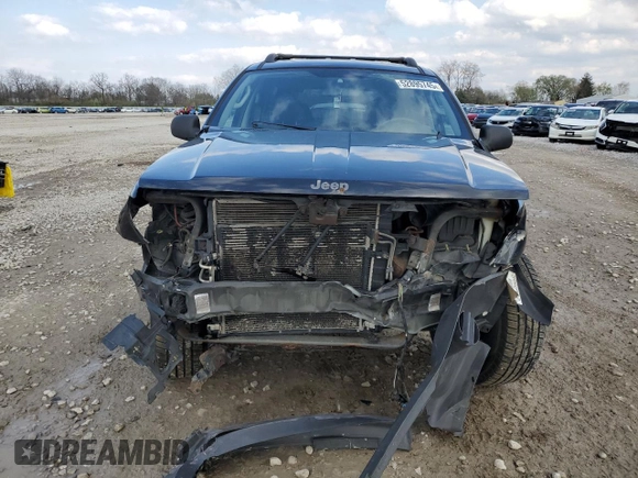 2004 Jeep Grand Cherokee Laredo with VIN 1J4GW48S84C184757, listed as a Copart auction lot 52895745 with 242,307 mi miles and Salvage Title. Bid and sale history available at carsss.com. Image 5.