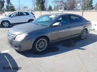 2007 Toyota Avalon XL with VIN 4T1BK36B77U197115, listed as a IAAI auction lot 41669729 with 289,786 mi miles. Bid and sale history available at carsss.com. Image 2.