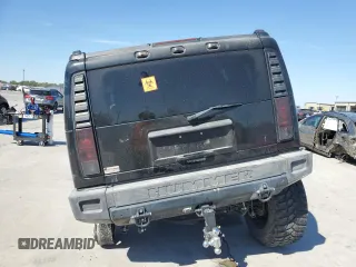 2005 Hummer H2 SUV with VIN 5GRGN23U95H101796, listed as a Copart auction lot 76991574 with 88,204 mi miles and Salvage Title. Bid and sale history available at carsss.com. Image 6.