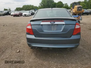 2012 Ford Fusion SEL z VIN 3FAHP0JG9CR412387, wystawiony jako Copart lot #58542715 z przebiegiem 143 112 mil mil oraz Czysty tytuł • Clean title. Historia ofert i sprzedaży dostępna na DreamBid. Obrazek 6.