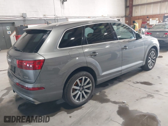 2018 Audi Q7 Premium Plus with VIN WA1LAAF77JD005933, listed as a IAAI auction lot 41737151 with 90,830 mi miles and . Bid and sale history available at DreamBid. Image 4.