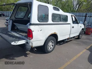 2003 Ford F-150 XL z VIN 2FTPF17Z73CA71197, wystawiony jako IAAI lot #42121486 z przebiegiem 236 800 mil mil oraz . Historia ofert i sprzedaży dostępna na DreamBid. Obrazek 4.