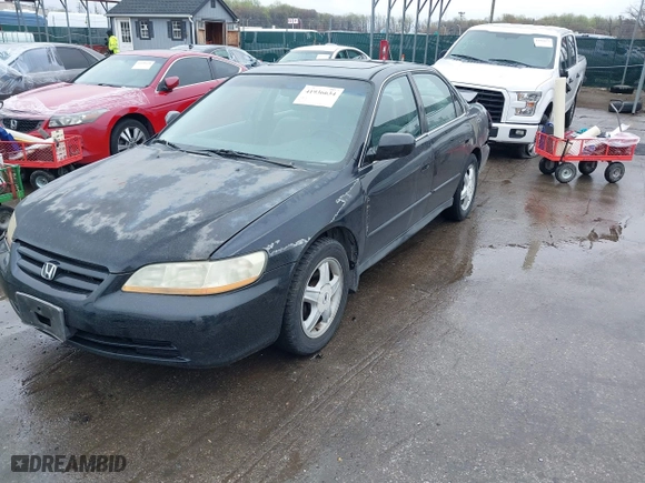2002 Honda Accord Sdn SE with VIN 1HGCG66872A114939, listed as a IAAI auction lot 41936634 with 195,610 mi miles. Bid and sale history available at carsss.com. Image 19.