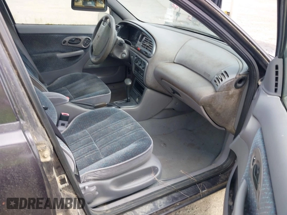 1995 Ford Contour z VIN 3FALP6633SM116313, wystawiony jako IAAI lot #42058920 z przebiegiem 192 905 mil mil oraz . Historia ofert i sprzedaży dostępna na DreamBid. Obrazek 5.
