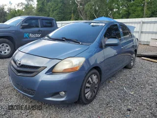 2009 Toyota Yaris z VIN JTDBT903X91297199, wystawiony jako Copart lot #57088615 z przebiegiem 161 170 mil mil oraz Szkody całkowita. Historia ofert i sprzedaży dostępna na DreamBid. Obrazek 1.