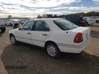 1995 Mercedes-Benz C with VIN WDBHA28E1SF151911, listed as a Copart auction lot 76814424 with 128,184 mi miles and Clean Title. Bid and sale history available at carsss.com. Image 2.