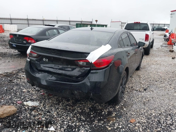 2014 Mazda 6 i Grand Touring with VIN JM1GJ1W69E1113895, listed as a IAAI auction lot 41953544 with 105,103 mi miles. Bid and sale history available at carsss.com. Image 4.