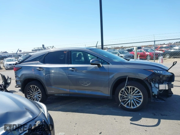 2020 Lexus RX 450h with VIN 2T2JGMDA2LC053394, listed as a IAAI auction lot 41979007 with 56,331 mi miles and . Bid and sale history available at DreamBid. Image 14.