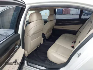 2011 BMW 7 Series 740Li with VIN WBAKB4C58BC575141, listed as a IAAI auction lot 42104510 with 100,361 mi miles and . Bid and sale history available at DreamBid. Image 8.