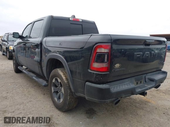 2019 Ram 1500 Rebel z VIN 1C6SRFLT1KN722064, wystawiony jako IAAI lot #41513201 z przebiegiem 113 559 mil mil oraz . Historia ofert i sprzedaży dostępna na DreamBid. Obrazek 3.