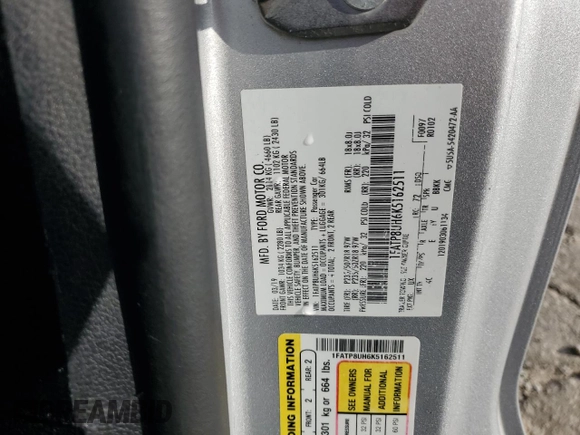 2019 Ford Mustang EcoBoost z VIN 1FATP8UH6K5162511, wystawiony jako Copart lot #62130385 z przebiegiem 115 537 mil mil oraz Szkoda całkowita • Salvage title. Historia ofert i sprzedaży dostępna na DreamBid. Obrazek 13.