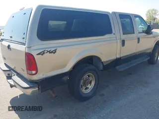 2001 Ford Super Duty F-250 XL with VIN 1FTNW21S71EA79137, listed as a IAAI auction lot 42115660 with 147,873 mi miles. Bid and sale history available at carsss.com. Image 4.