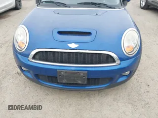 2007 MINI Hardtop S with VIN WMWMF73527TL91061, listed as a IAAI auction lot 41842104 with 65,259 mi miles and . Bid and sale history available at DreamBid. Image 6.