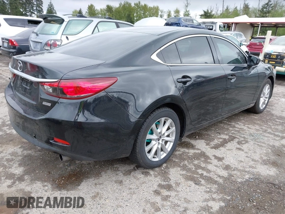 2016 Mazda 6 i Sport with VIN JM1GJ1U53G1451578, listed as a IAAI auction lot 42134810 with 113,144 mi miles and . Bid and sale history available at DreamBid. Image 4.