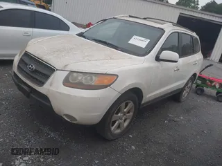 2007 Hyundai Santa Fe SE z VIN 5NMSH13E57H063796, wystawiony jako IAAI lot #42356059 z przebiegiem 270 309 mil mil oraz . Historia ofert i sprzedaży dostępna na DreamBid. Obrazek 2.