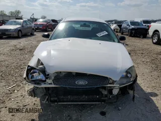 2006 Ford Taurus SE с VIN 1FAFP53U66A245685, выставлен на аукционе Copart как лот 53472415 с пробегом 100 110 миль миль и Списание • Salvage title. История ставок и продаж доступна на DreamBid. Изображение 5.