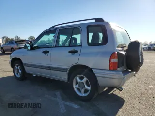 2002 Suzuki Vitara JLS z VIN 2S3TE52V126109079, wystawiony jako Copart lot #41477725 z przebiegiem 147 255 mil mil oraz Szkody całkowita. Historia ofert i sprzedaży dostępna na DreamBid. Obrazek 2.