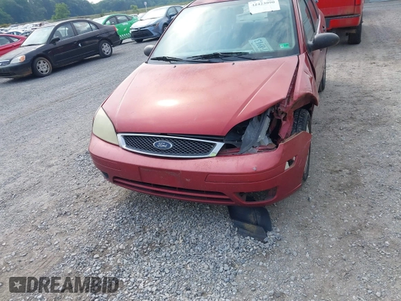 2005 Ford Focus S with VIN 1FAFP34N35W277846, listed as a IAAI auction lot 42423090 with 338,234 mi miles and . Bid and sale history available at DreamBid. Image 13.