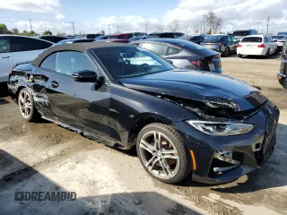 2023 BMW 4 Series 430i with VIN WBA23AT02PCL61138, listed as a Copart auction lot 45606085 with 18,698 mi miles and Salvage Title. Bid and sale history available at carsss.com. Image 4.