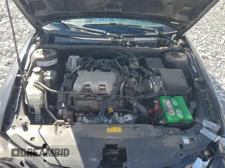 1999 Pontiac Grand Am SE2 with VIN 1G2NE52E2XM732523, listed as a Copart auction lot 75420684 with 124,110 mi miles and Salvage Title. Bid and sale history available at carsss.com. Image 13.