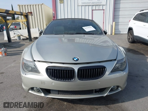 2006 BMW 6 Series 650Ci z VIN WBAEK13486CN72278, wystawiony jako IAAI lot #41119321 z przebiegiem 170 553 mil mil oraz . Historia ofert i sprzedaży dostępna na DreamBid. Obrazek 12.