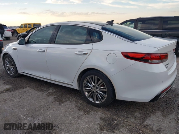 2018 Kia Optima SX with VIN 5XXGV4L21JG182103, listed as a IAAI auction lot 40522762 with 60,542 mi miles and . Bid and sale history available at DreamBid. Image 3.