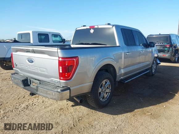 2021 Ford F-150 XL with VIN 1FTEW1CP3MFC30671, listed as a IAAI auction lot 41670207 with 56,540 mi miles. Bid and sale history available at carsss.com. Image 4.