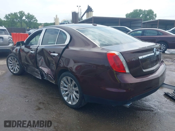 2009 Lincoln MKS with VIN 1LNHM93R69G628697, listed as a IAAI auction lot 39338358 with 125,585 mi miles and . Bid and sale history available at DreamBid. Image 3.