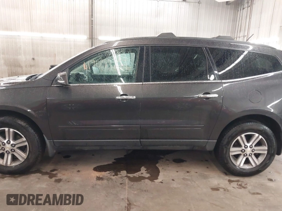 2015 Chevrolet Traverse LT with VIN 1GNKVHKD5FJ192552, listed as a IAAI auction lot 41708239 with 185,664 mi miles and . Bid and sale history available at DreamBid. Image 15.