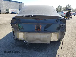 2023 Tesla Model 3 with VIN 5YJ3E1EA4PF562792, listed as a Copart auction lot 55994165 with 17,234 mi miles and Salvage title. Bid and sale history available at DreamBid. Image 6.