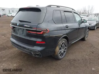 2025 BMW X7 M60i with VIN 5UX33EM08S9X65854, listed as a IAAI auction lot 41689675 with 2,595 mi miles. Bid and sale history available at carsss.com. Image 4.
