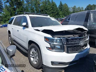 2019 Chevrolet Suburban LT with VIN 1GNSKHKC2KR213286, listed as a IAAI auction lot 42432590 with 208,923 mi miles and . Bid and sale history available at DreamBid. Image 1.