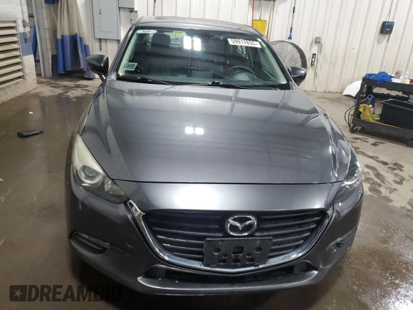 2017 Mazda 3 Touring with VIN 3MZBN1V74HM149040, listed as a Copart auction lot 59917855 with 204,440 mi miles and Salvage title. Bid and sale history available at DreamBid. Image 5.