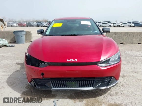 2022 Kia EV6 Wind z VIN KNDC3DLC6N5089018, wystawiony jako IAAI lot #41748175 z przebiegiem 25 157 mil mil oraz . Historia ofert i sprzedaży dostępna na DreamBid. Obrazek 12.