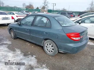 2003 Kia Rio with VIN KNADC125336231562, listed as a IAAI auction lot 41386659 with 87,965 mi miles. Bid and sale history available at carsss.com. Image 3.